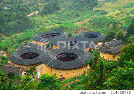 Tianluokeng Tulou cluster located in the village of Tianluokeng, fujian, china 114688788