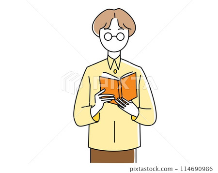 A man standing and reading a book A man standing and reading a book 114690986