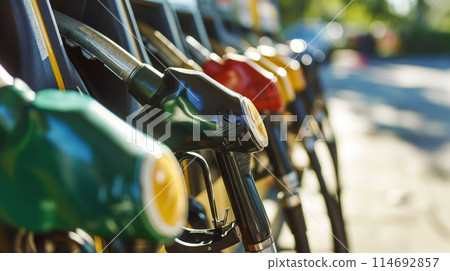 Fuel pumps at a service station. 114692857