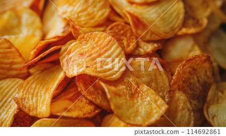 Heap of crispy golden potato chips. Heap of crispy golden potato chips. 114692861