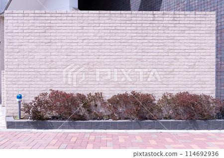 street wall background ,Industrial background, empty grunge urban street with warehouse brick wall street wall background ,Industrial background, empty grunge urban street with warehouse brick wall 114692936