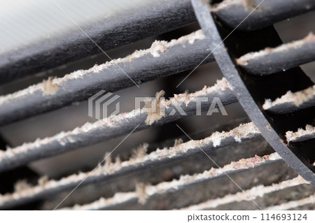 Dirt, mold, and dust on the air conditioner fan Dirt, mold, and dust on the air conditioner fan 114693124