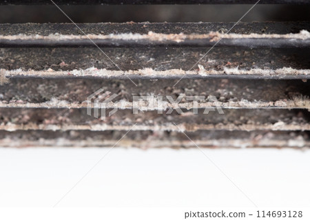 Dirt, mold, and dust on the air conditioner fan Dirt, mold, and dust on the air conditioner fan 114693128