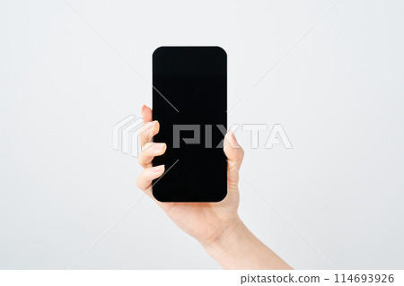 Women's hand with smartphone 114693926