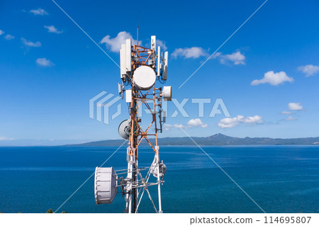 aerial view around of the telecommunication tower. tower antennas satellite transmits the signals aerial view around of the telecommunication tower. tower antennas satellite transmits the signals 114695807