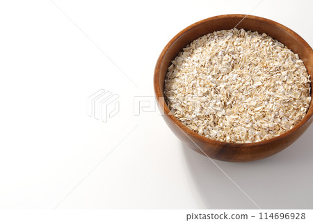 Oatmeal served in a wooden bowl Oatmeal served in a wooden bowl 114696928