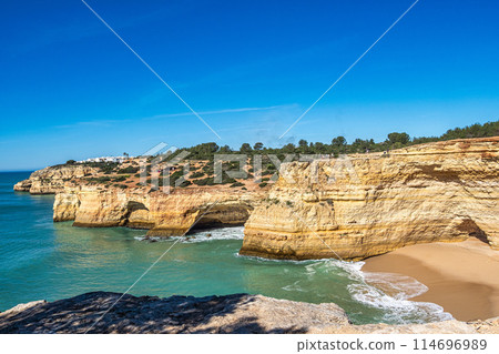 Portuguese coast in Benagil, Algarve, Portugal. Praia da Corredoura. Seven Hangging Valleys Trail. Portuguese coast in Benagil, Algarve, Portugal. Praia da Corredoura. Seven Hangging Valleys Trail. 114696989