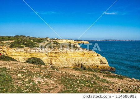 Portuguese coast in Benagil, Algarve, Portugal. Praia do Carvalho. Seven Hangging Valleys Trail. 114696992