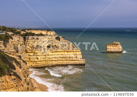 Praia da Marinha Beach among rock islets and cliffs seen from Seven Hanging Valleys Trail, Algarve, Portugal Praia da Marinha Beach among rock islets and cliffs seen from Seven Hanging Valleys Trail, Algarve, Portugal 114697030