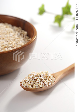 Oatmeal served in a wooden bowl Oatmeal served in a wooden bowl 114697186