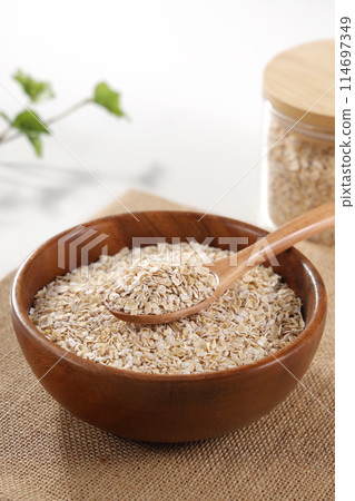 Oatmeal served in a wooden bowl Oatmeal served in a wooden bowl 114697349