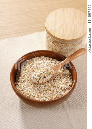 Oatmeal served in a wooden bowl Oatmeal served in a wooden bowl 114697522