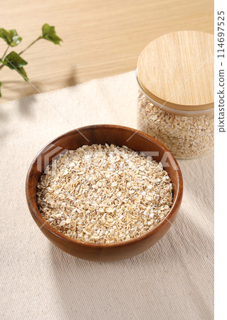 Oatmeal served in a wooden bowl Oatmeal served in a wooden bowl 114697525