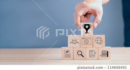 Stack woods block step on table with icon about business strategy and Action plan,business strategy, Goal and target, business development concept. copy space. Stack woods block step on table with icon about business strategy and Action plan,business strategy, Goal and target, business development concept. copy space. 114698491