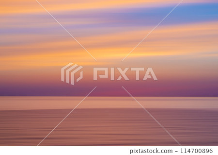 Image depicting flowing clouds and the sea Image depicting flowing clouds and the sea 114700896