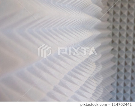 Audio Treatment Material. Grey foam with pyramid shapes for sound dampening. Audio Treatment Material. Grey foam with pyramid shapes for sound dampening. 114702441