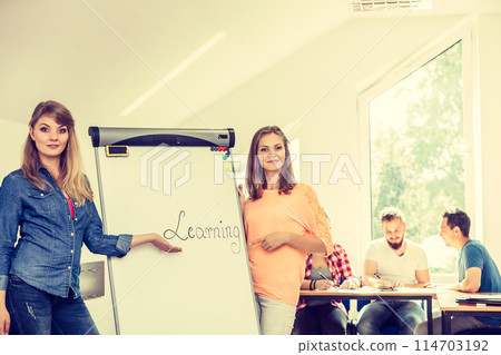 Student girls writting Learning word on whiteboard 114703192