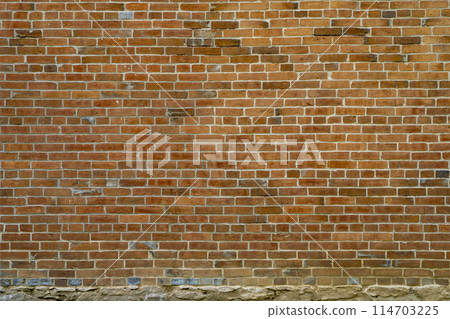 background and texture of old brick building wall 114703225