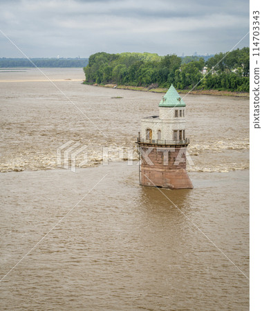 Historic water intake tower built in 1891 below the Old Chain of Rocks bridge on the Mississippi River near St Louis 114703343