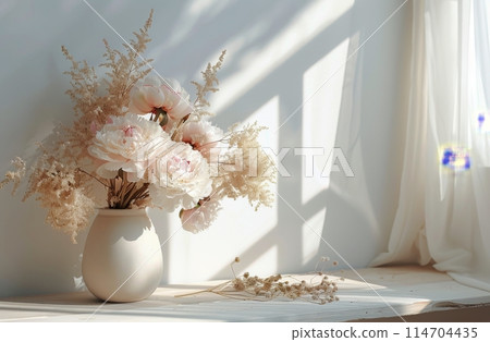 White Vase Filled With Pink Flowers 114704435