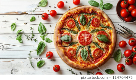 Pizza With Tomatoes and Herbs on a White Table 114704475