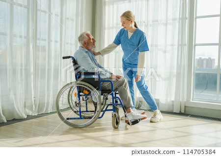 Help support retirement healthcare. Nurse helping old man in wheelchair. Patient and woman in nursing home for medical caregiver. Nurse taking care of paralyzed man in chair for people with disability 114705384