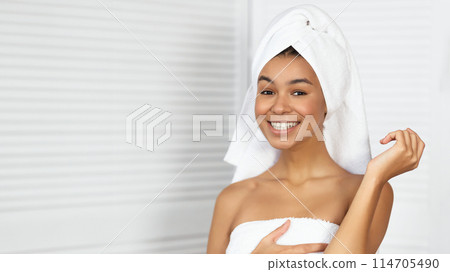 Self-Care Day. Black Young Lady With Towel On Head Smiling At Camera Standing In Bathroom After Shower. Selective Focus 114705490