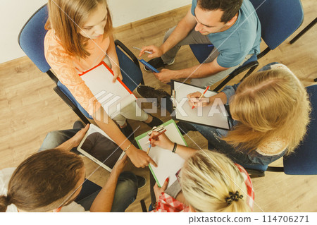 Group of people students working together Group of people students working together 114706271