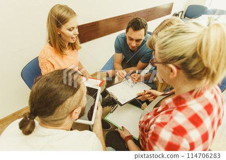 Group of people students working together Group of people students working together 114706283