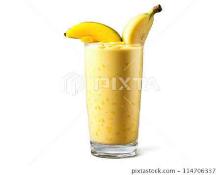 Mango Banana Smoothie A tropical mango banana smoothie in a modern glass adorned with mango 114706337