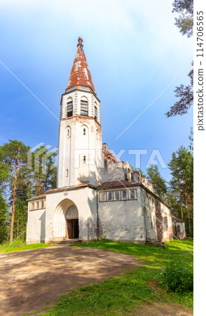 Beautiful view to Finnish Lutheran Church in Lumivaara village. Building in Neo-Gothic style in summer sunny day. Attractions of Lahdenpokh district. Designed architect Adolf Ilmari. Karelia Russia. Beautiful view to Finnish Lutheran Church in Lumivaara village. Building in Neo-Gothic style in summer sunny day. Attractions of Lahdenpokh district. Designed architect Adolf Ilmari. Karelia Russia. 114706565