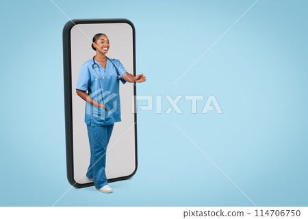 Glad millennial black millennial woman nurse, surgeon in blue uniform give hand to say hello at big phone with empty screen, isolated on gray background studio. Health care, shake hands gesture Glad millennial black millennial woman nurse, surgeon in blue uniform give hand to say hello at big phone with empty screen, isolated on gray background studio. Health care, shake hands gesture 114706750