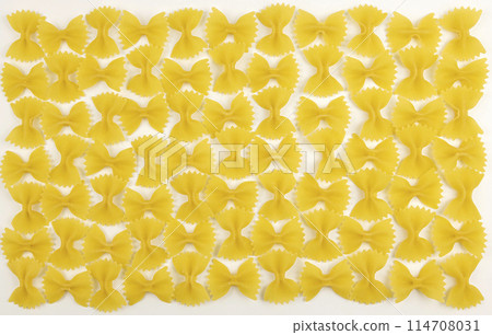 Isolated pasta in the form of bows with clipping path on a white background. Isolated pasta in the form of bows with clipping path on a white background. 114708031