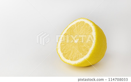 Half a lemon. Sliced lemon, fresh juicy lemon. Half a lemon. Sliced lemon, fresh juicy lemon. 114708033