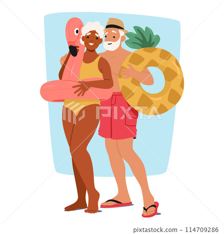 Affectionate Elderly Couple Smiles On A Sunny Day, Holding Colorful Inflatable Swim Rings. Woman Has Pink Flamingo Ring 114709286