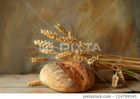 The concept of baking bread. Various breads and wheat varieties displayed on the table 114709343