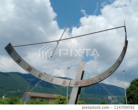 ancient vertical iron construction used as a sundial tower Botticino, Brescia in northern Italy 114709592