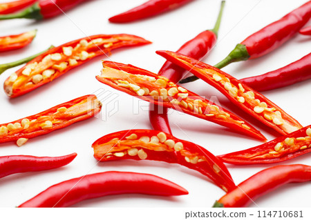 Red chili peppers on white background 114710681