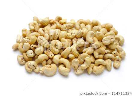 Cashew nuts on white background. Cashew nuts on white background. 114711324