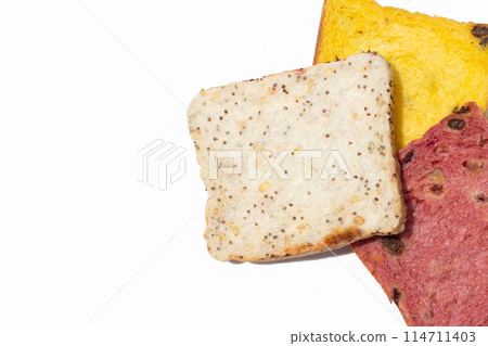 Whole grain bread slices on white background. Whole grain bread slices on white background. 114711403