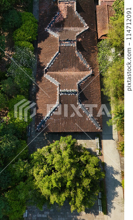 Aerial view of Mekong Delta, Ben Tre tourist with large ancient tree, Apricot or Bach Mai flower, a heritage tree and old house at Phu Tu temple, a travel destination for Vietnam 114712091