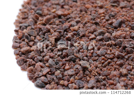 Black himalayan salt on white background. Black himalayan salt on white background. 114712268