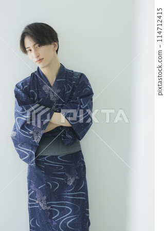 Young man in yukata Young man in yukata 114712415