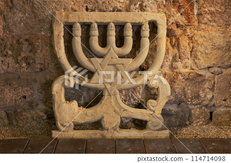 Jewish symbols. Antique Star of David and menorah. Jewish symbols. Antique Star of David and menorah. 114714098