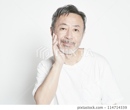 Middle-aged man portrait on white background Middle-aged man portrait on white background 114714339