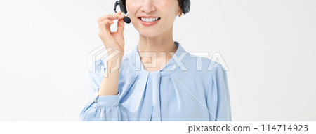 A woman with a headset A woman with a headset 114714923