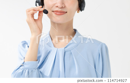 A woman with a headset A woman with a headset 114714927