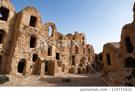 Uninhabited fortified village with houses and granaries, Tunisia. Ksar of Mgabla, Berber, Tataouine. Uninhabited fortified village with houses and granaries, Tunisia. Ksar of Mgabla, Berber, Tataouine. 114715922