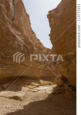 Sunlit Tamaghza canyon with sandstone cliffs in Tunisia 114715955