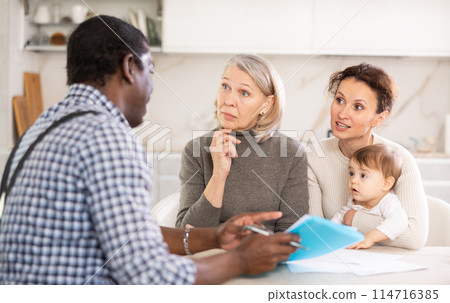 Male agent makes deal with family Male agent makes deal with family 114716385